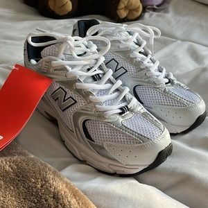 New. NB New Balance 530 White/ Grey. Size is a women’s 7 I would say.